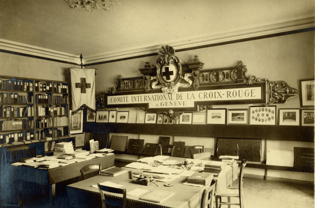 Photo of the old office of the International Committee of the Red Cross with a desk and book shelves