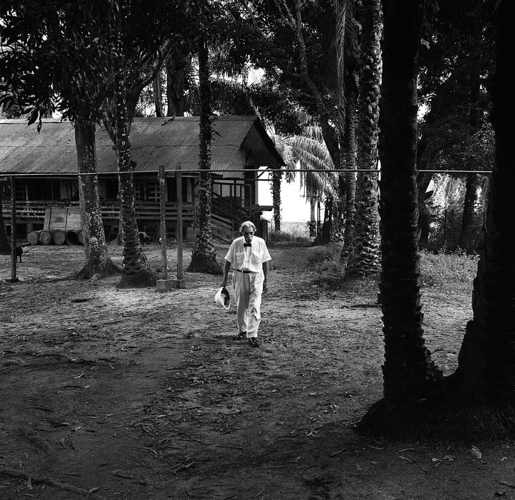 A man walking from a house