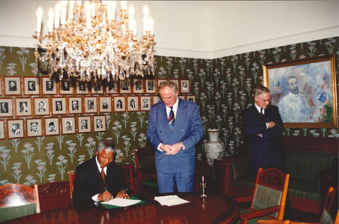 Nelson Mandela signing protocol