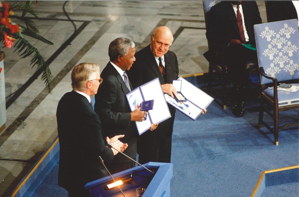 Nelson Mandela and F.W. de Klerk with their Nobel Prize medals and diplomas.