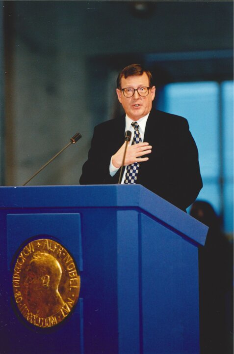 A man standing on a lectern