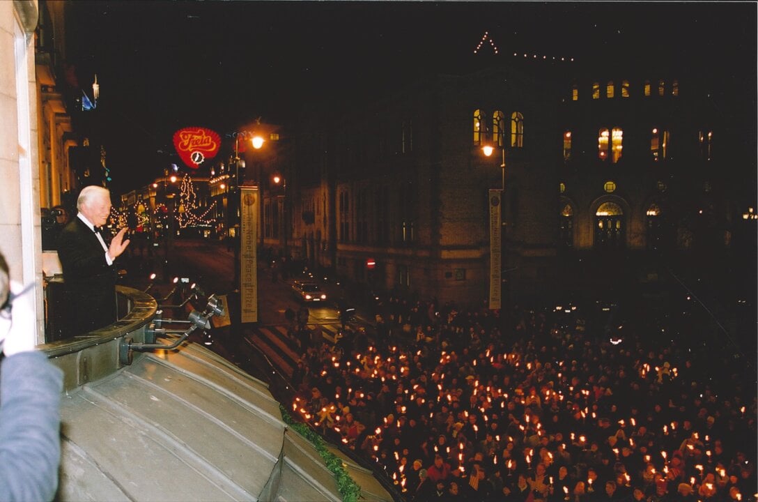 Jimmy Carter viewing the traditional torch light procession
