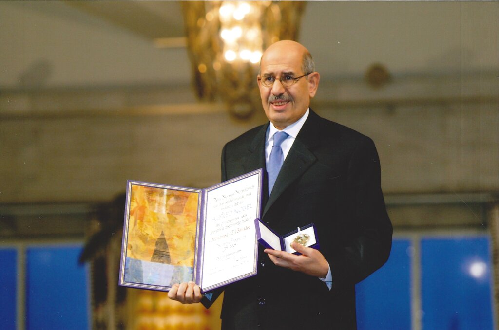 Mohamed ElBaradei with his Nobel Prize medal and diploma