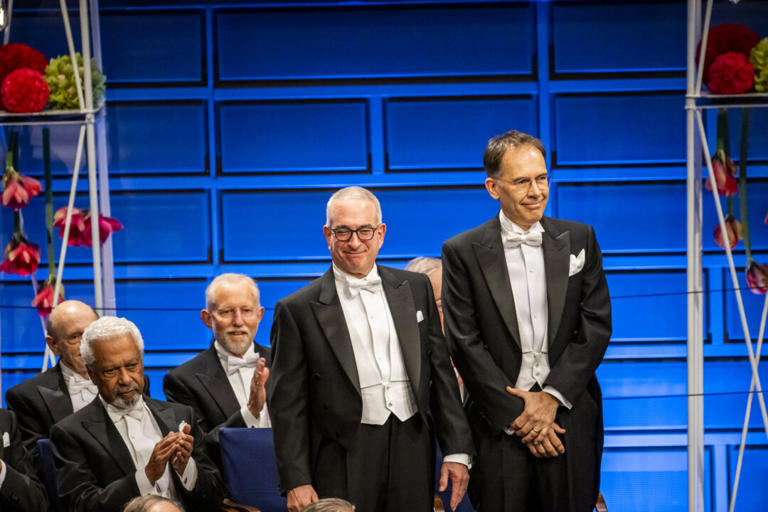 Joshua D. Angrist and Guido W. Imbens at the Nobel Prize award ceremony