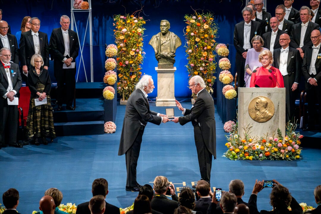 Pierre Agostini receiving his Nobel Prize
