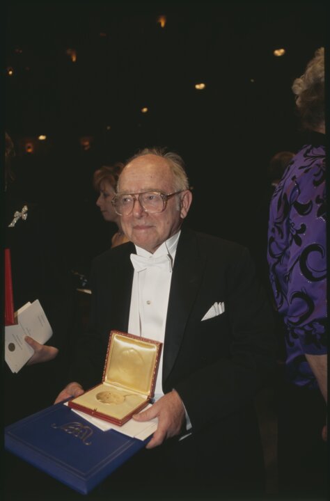 Clifford G. Shull showing his Nobel Prize diploma