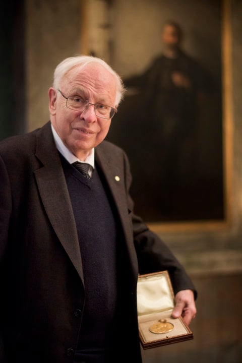 Tomas Lindahl showing his Nobel Medal during his visit to the Nobel Foundation on 12 December 2015. On this occasion, the Laureates retrieve the Nobel diploma and Medal, which have been displayed in the Golden Hall of the City Hall following the Nobel Prize Award Ceremony. The Laureates also discuss the details concerning the transfer of their prize money.