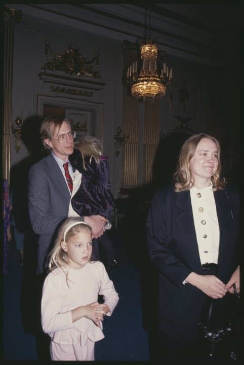 Photo of a man with a woman and two small girls