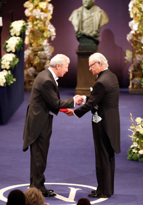 Jules A. Hoffmann receiving his Nobel Prize from His Majesty King Carl XVI Gustaf