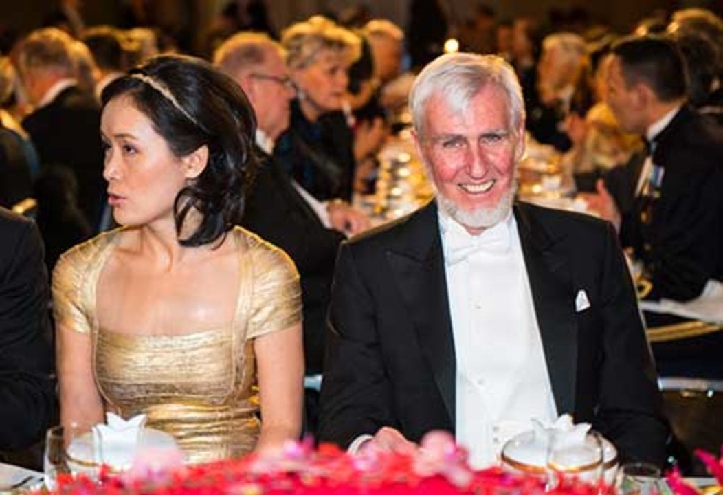Dr Na Ji, spouse of Nobel Laureate Eric Betzig, and John O'Keefe at the table of honour at the Nobel Banquet, 10 December 2014.