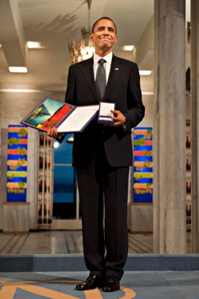 Barack H. Obama with his Nobel Peace Prize Medal and Diploma