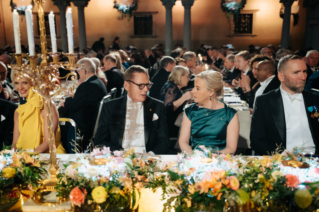 A woman and a man at a banquet table