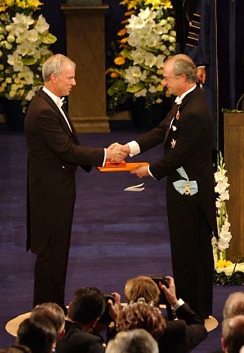 A. Michael Spence and His Majesty the King