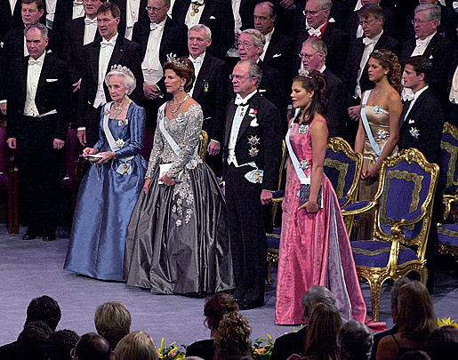 The Swedish Royal Family stands to sing the royal anthem.