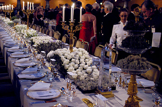 The table of honour at the 2003 Nobel Banquet, richly decorated with flowers