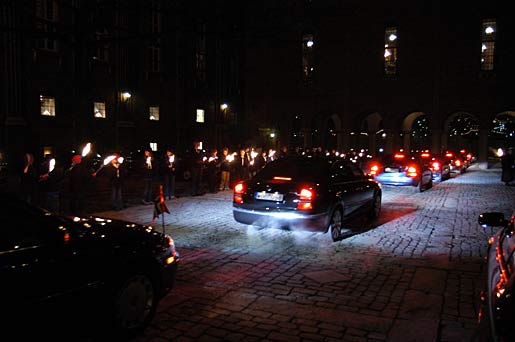 A parade of cars carrying the Nobel Laureates to the Nobel Banquet