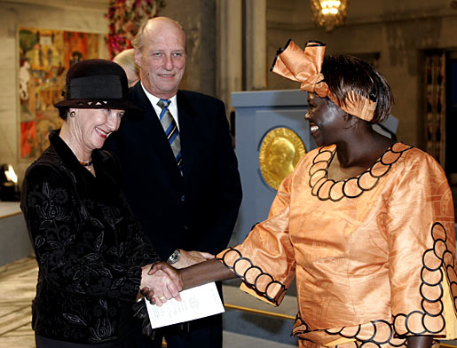 Nobel Peace Prize Laureate Wangari Maathai, right, shakes hands with Norway's Queen Sonja