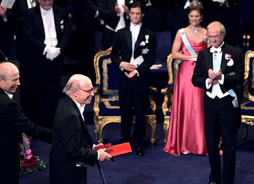 American Irwin A. Rose acknowledges the applause after receiving the Nobel Prize in Chemistry