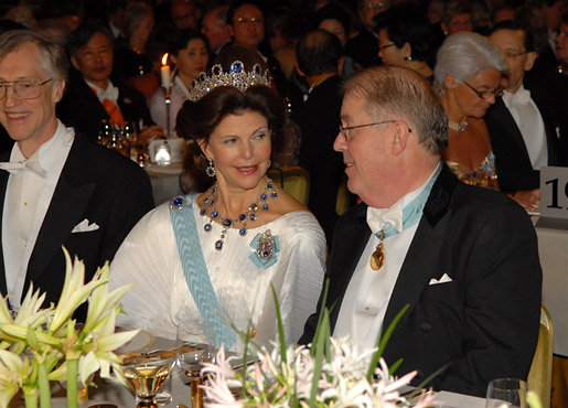 Queen Silvia of Sweden conversing with Dr Marcus Storch