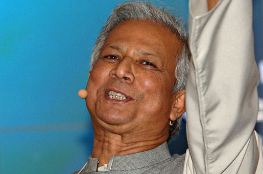 Muhammad Yunus acknowledging the cheers of the crowd during the Nobel Peace Prize Concert