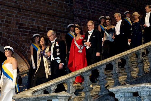 Albert Fert and Sweden's Crown Princess Victoria at the top of the stairs, descending into the Blue Hall of the Stockholm City Hall