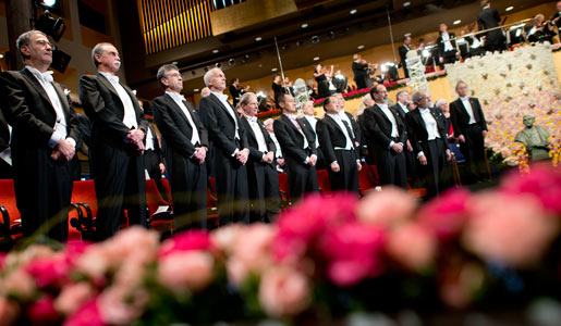 The 2012 Nobel Laureates on stage at the Stockholm Concert Hall