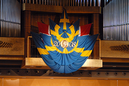 The Swedish flag above the stage of the Stockholm Concert Hall