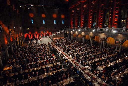 Inside the Blue Hall at the Stockholm City Hall, guests begin to dine on the specially prepared menu for the banquet