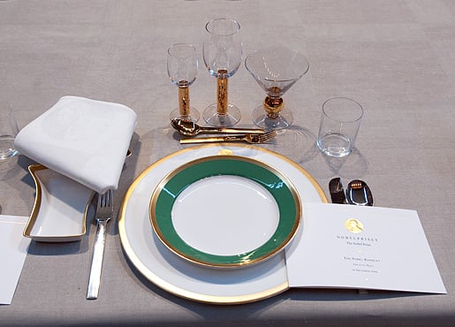 Banquet tables laid with the special Nobel tableware set