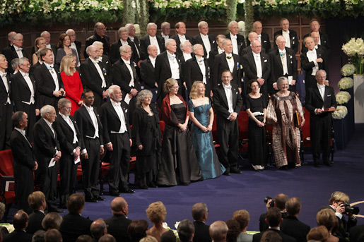 The 2009 Nobel Laureates stand for the Swedish national anthem
