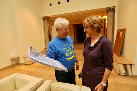 Richard Thaler consults his wife France Leclerc about which shirt to wear.