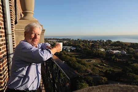 Richard Thaler stands on his back terrace