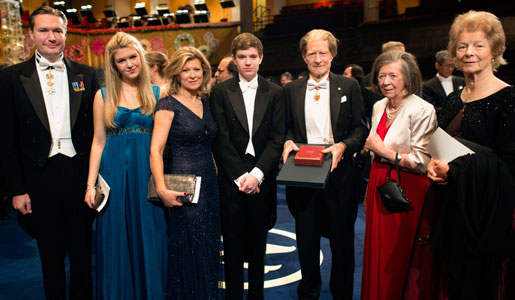 Sir John B. Gurdon with family and relatives on stage after the Nobel Prize Award Ceremony at the Stockholm Concert Hall