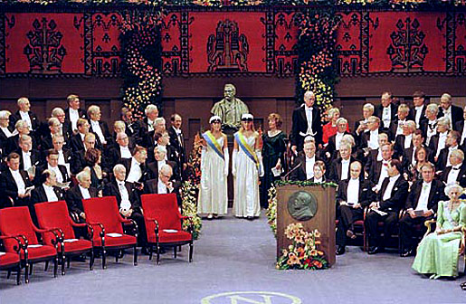 Empty red chairs await the 1999 Nobel Laureates