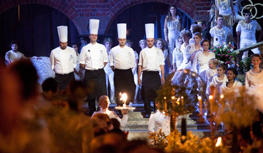 The main chefs of the banquet receive applause