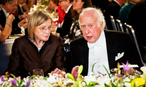 Peter Higgs in a conversation with Mrs Marci Hazard at the table of honour. 