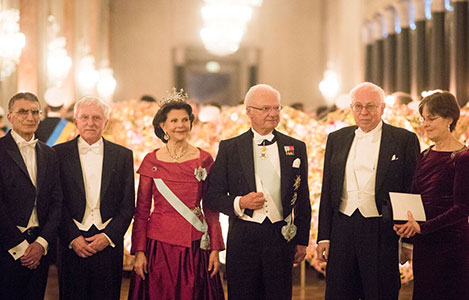 The Swedish Royal Family receives the Nobel Laureates and their significant others in the Prince's Gallery. From left: Chemistry Laureates Aziz Sancar and Paul Modrich, Queen Silvia and King Carl XVI Gustaf of Sweden, Chemistry Laureate Tomas Lindahl, and Dr Vickers Burdett, partner of Paul Modrich.