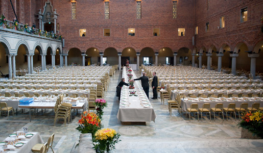 The tables in the Blue Hall of the Stockholm City Hall are all set