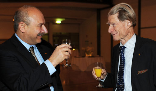 Sir John B. Gurdon (right) is greeted by Bruce A. Beutler, 2011 Nobel Laureate in Physiology or Medicine, at a reception at Karolinska Institutet