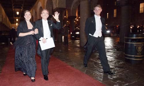 Randy W. Schekman arrives at the Nobel Banquet in the Stockholm City Hall together with his daughter, Mrs Lauren Schekman, 10 December 2013