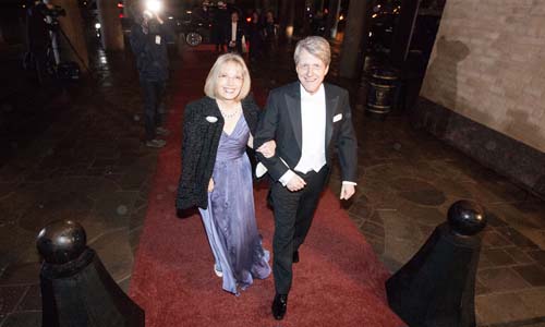 Robert J. Shiller and Mrs Virginia Shiller arrive at the Nobel Banquet at the Stockholm City Hall on 10 December 2013. 