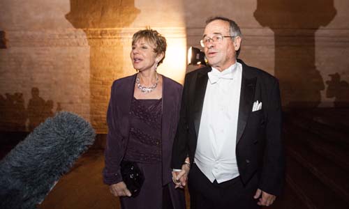 Arieh Warshel and Mrs Tamar Warshel arrive at the Nobel Banquet at the Stockholm City Hall on 10 December 2013.