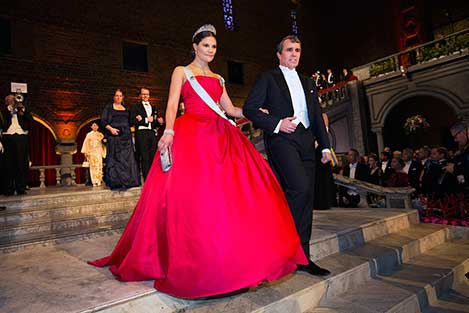Sweden's Crown Princess Victoria and Eric Betzig proceed into the Blue Hall of the Stockholm City Hall for the Nobel Banquet.