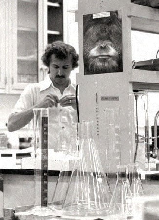 Duke assistant professor doing an experiment.
