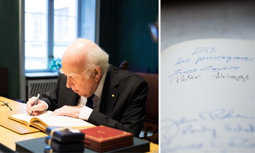 Peter Higgs visits the Nobel Foundation on 11 December 2013 and signs the guest book