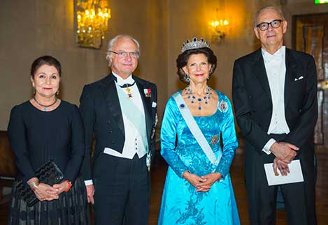 The Swedish Royals receive the Nobel Laureates and their significant others in the Prince's Gallery after the Nobel Banquet. From left to right: Dominique Modiano, His Majesty King Carl XVI Gustaf of Sweden, Her Majesty Queen Silvia, and Patrick Modiano.