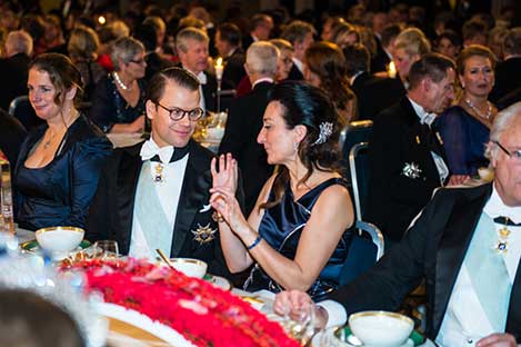 Sweden's Prince Daniel and May-Britt Moser in an animated discussion during the Nobel Banquet.