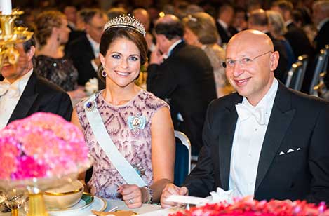 Sweden's Princess Madeleine and Stefan W. Hell at the table of honour at the Nobel Banquet, 10 December 2014.