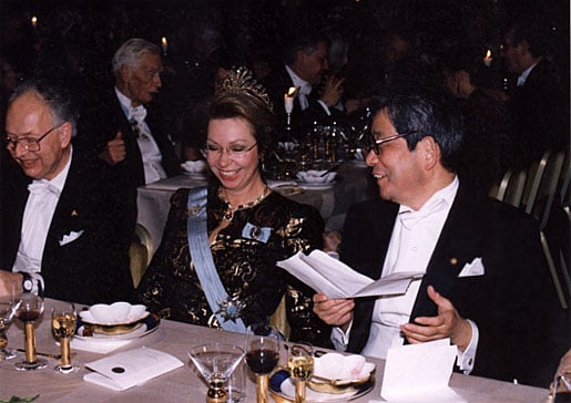 Princess Christina of Sweden shares a light moment with Kenzaburo Oe (right), and Reinhard Selten, Laureate in Economic Sciences, at the Nobel Banquet.