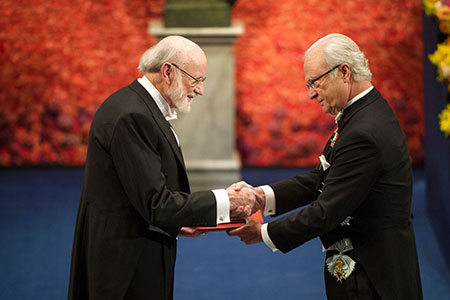 William C. Campbell  receiving his Nobel Prize from H.M. King Carl XVI Gustaf of Sweden